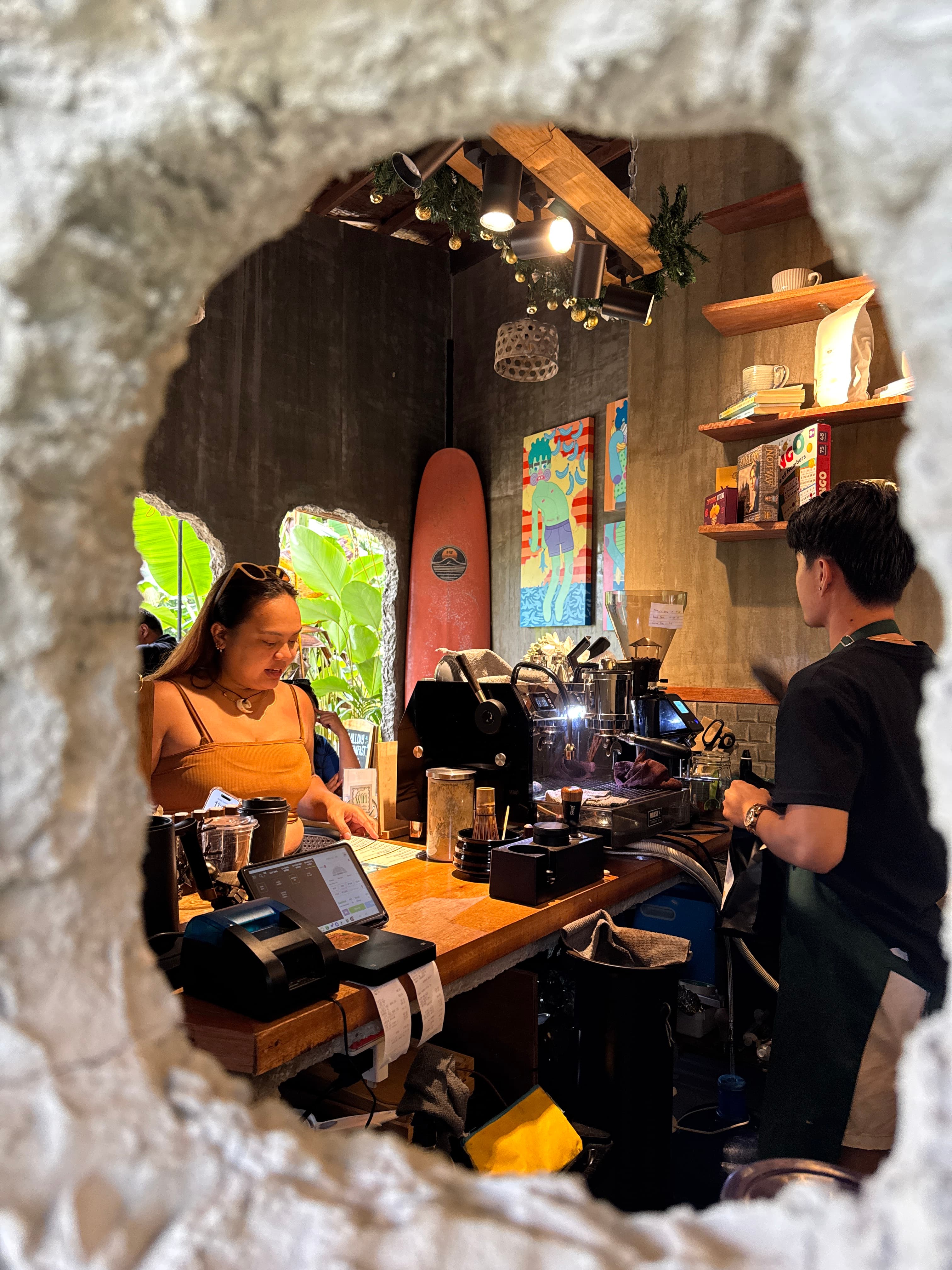 Inside Weekend Cafe - barista at work
